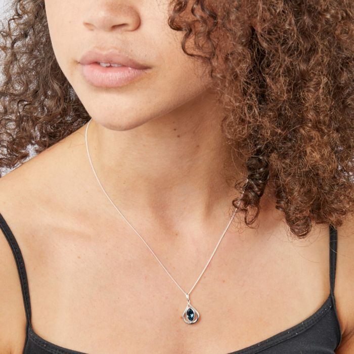 Sterling Silver Open Teardrop Pendant With Montana Blue Crystal